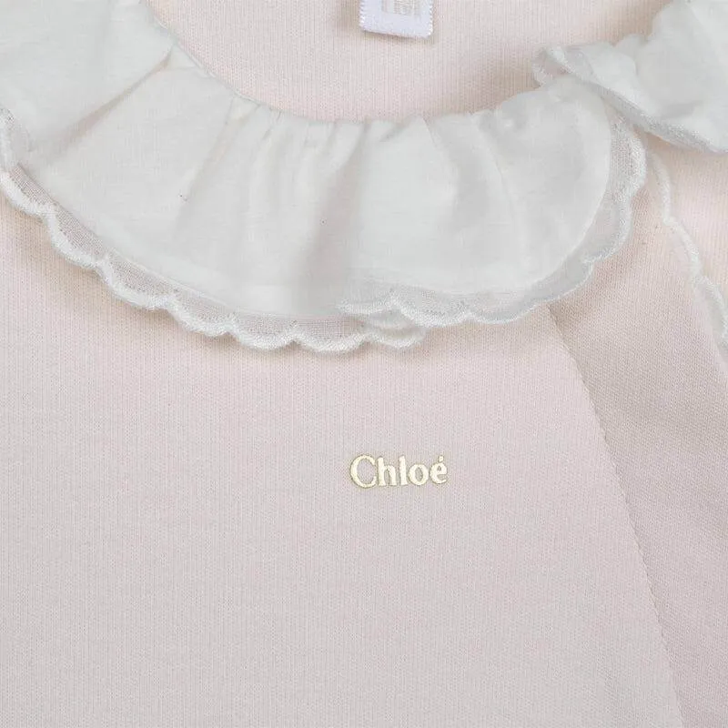 Ensemble de grenouillère en coton bio pêche pour bébé fille