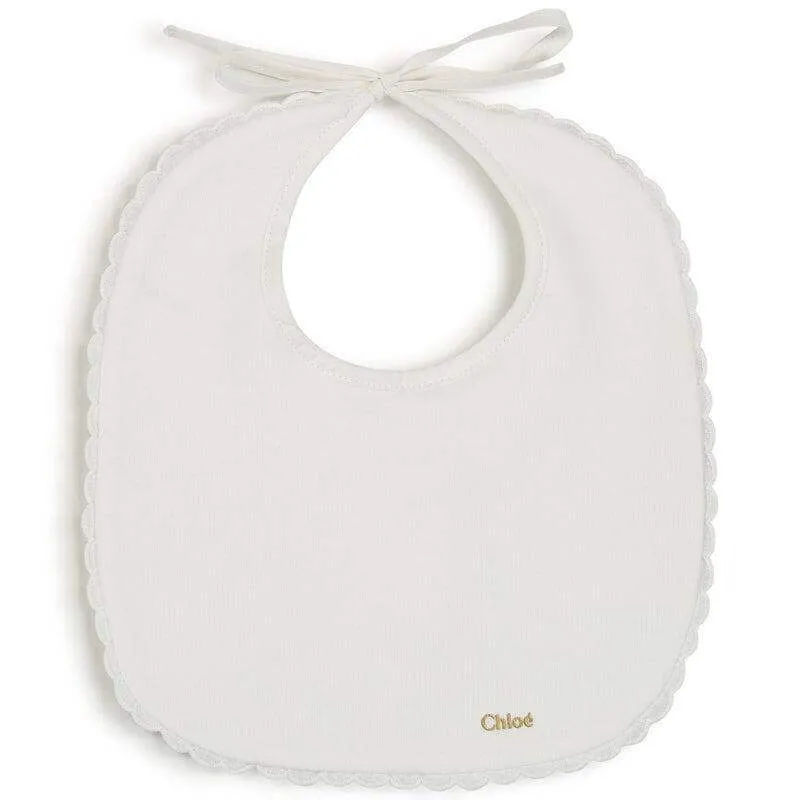 Ensemble de grenouillère en coton bio pêche pour bébé fille