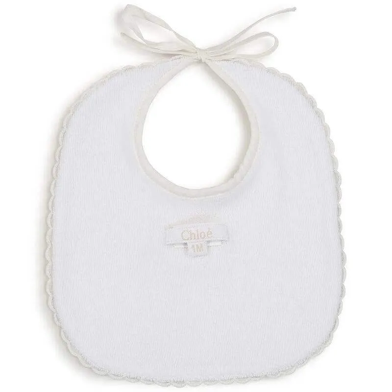 Ensemble de grenouillère en coton bio pêche pour bébé fille