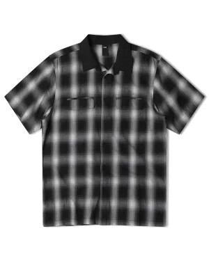 Chemise à carreaux à manches courtes avec boutons
