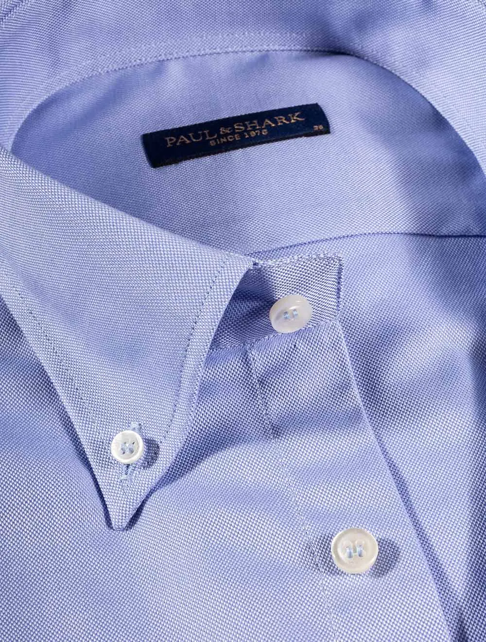 Chemise à carreaux bleue boutonnée