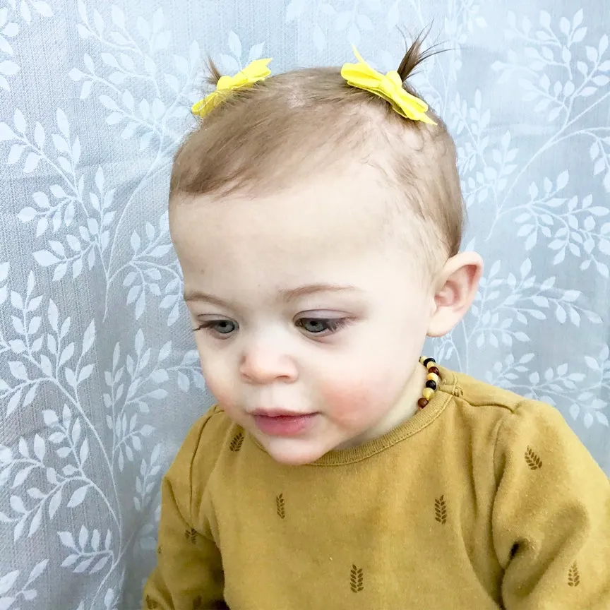 Ensemble de 5 barrettes à pression avec nœuds en gros-grain Chelsea - Chasse aux œufs de Pâques par Baby Wisp
