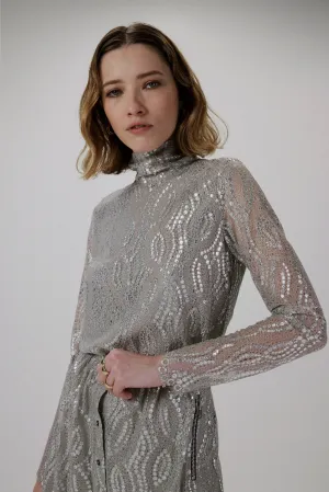 Venez en tête avec de la dentelle champagne