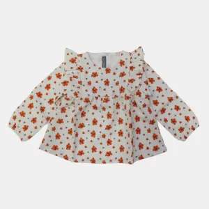 Blouse à manches longues à épaules froncées florale