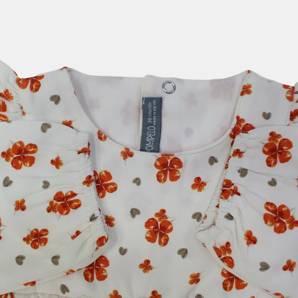 Blouse à manches longues à épaules froncées florale