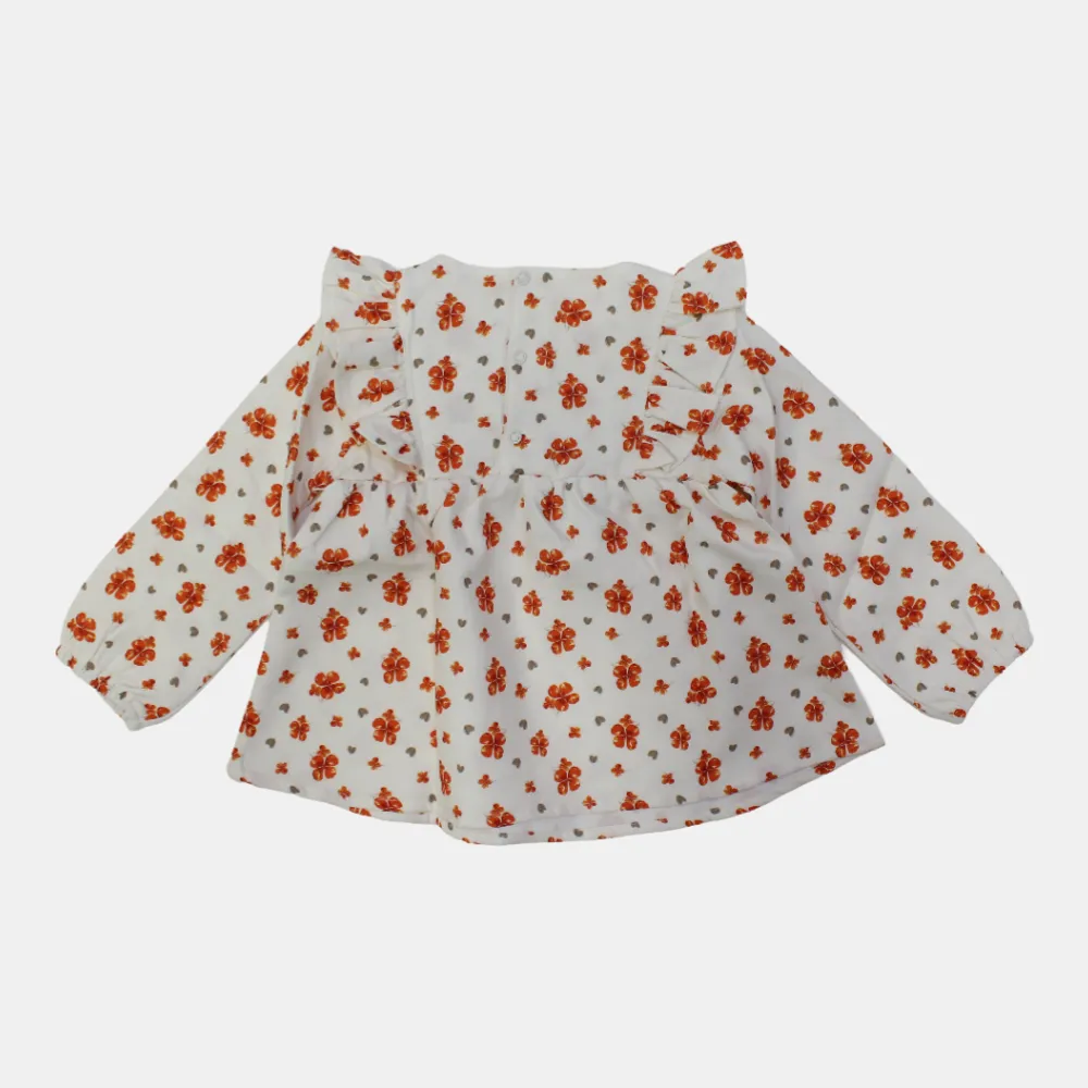 Blouse à manches longues à épaules froncées florale