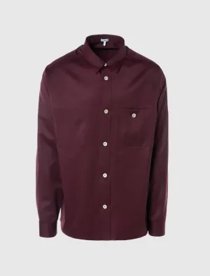 CHEMISE À BOUTONS MÉTALLIQUES