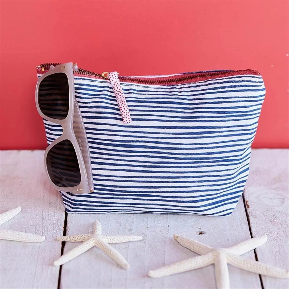 Pochettes Suri Navy Medium